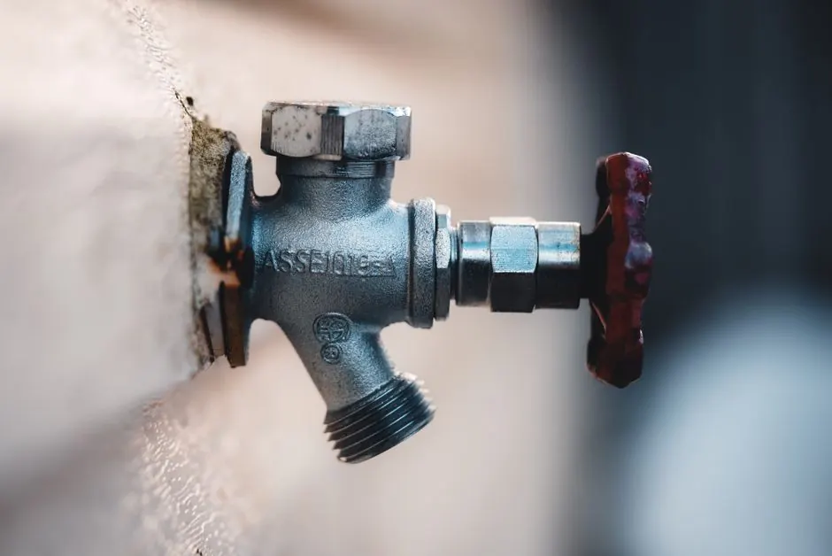 Steel shutoff valve mounted on a wall